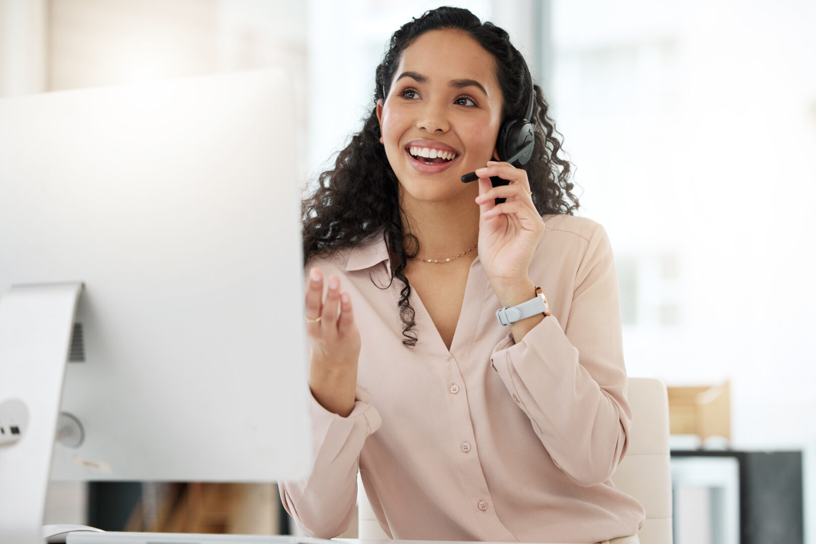 Business woman, call center and smile in customer service, support or telemarketing at office. Happy and friendly female person, consultant or agent smiling in online advice or telesales at workplace