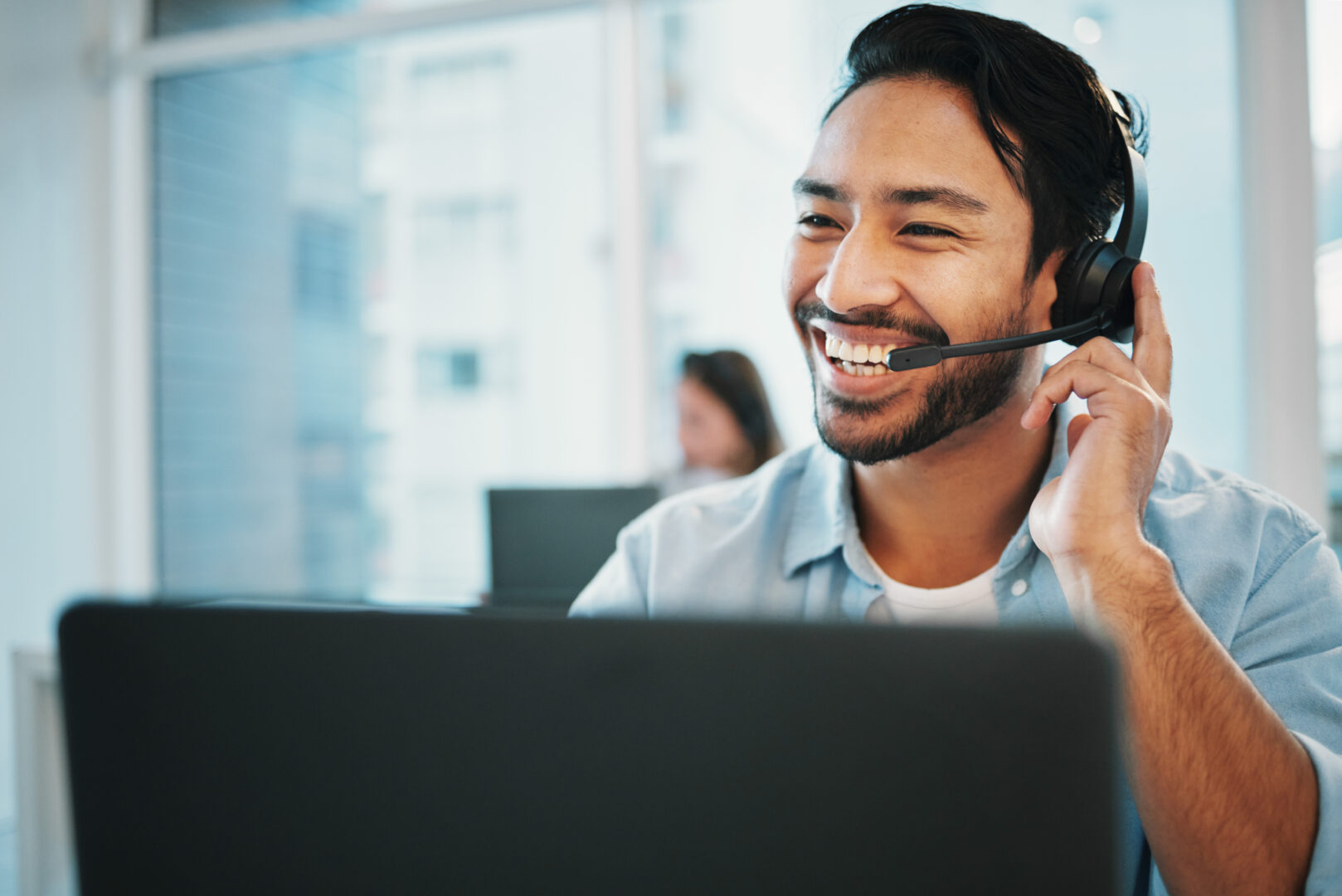 Business man, happy call center and computer for communication, technical support and online advice. Professional Asian agent, consultant or advisor on laptop for information technology or funny chat